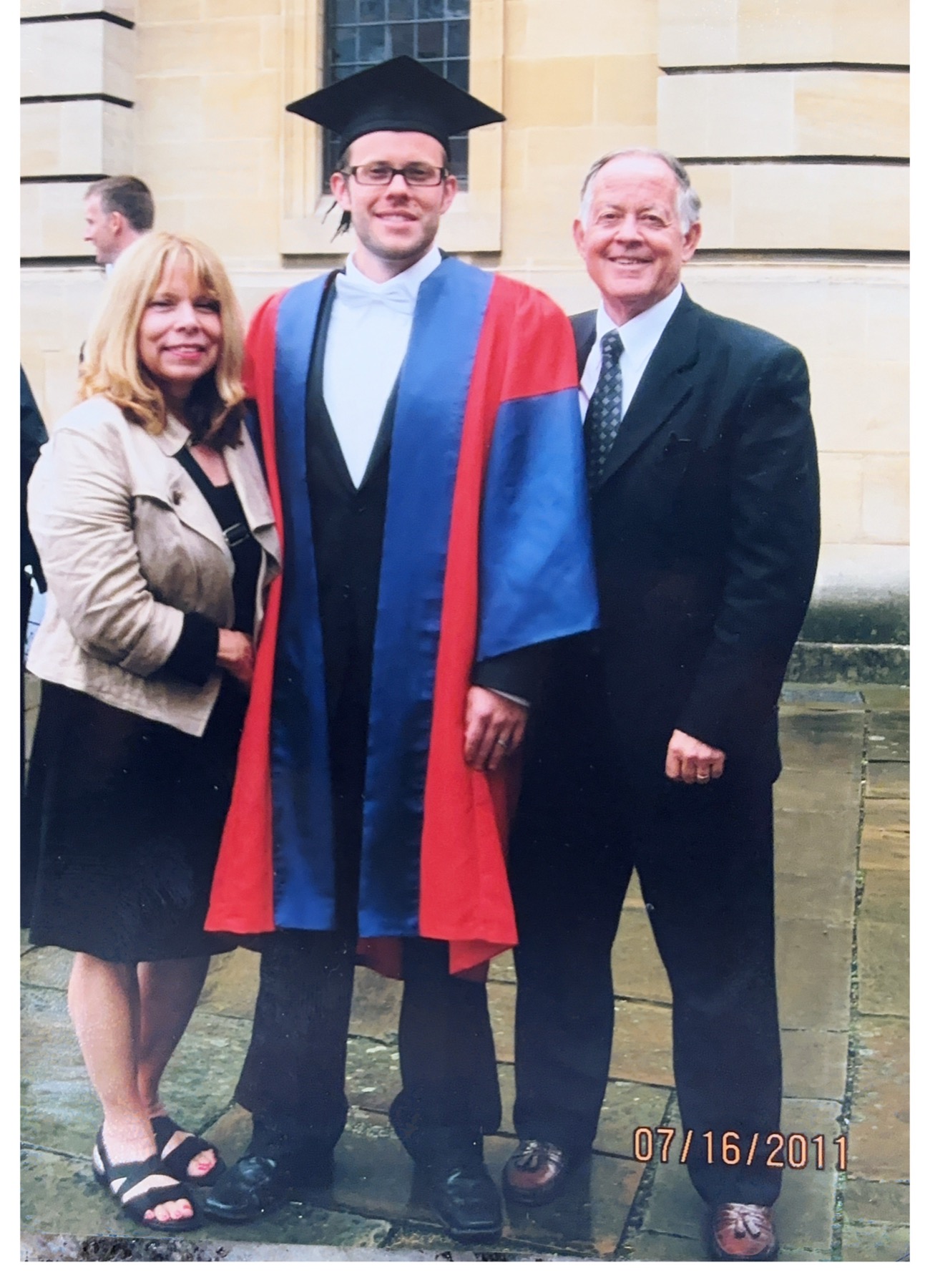 Stephen Andes in his University of Oxford doctoral robes with family at his graduation